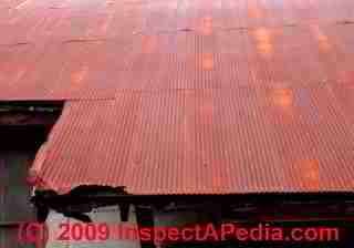 Badly rusted corrugated metal roofing (C) Daniel Friedman