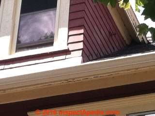 Dormer flashing defects at roof intersection (C) InspectApedia.com NBC