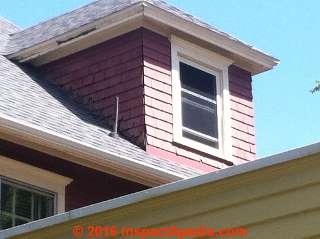 Dormer flashing defects at roof intersection (C) InspectApedia.com NBC