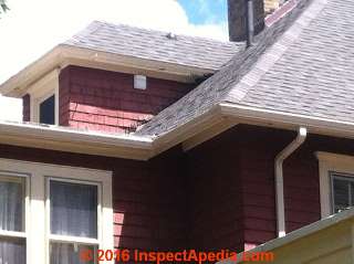 Dormer flashing defects at roof intersection (C) InspectApedia.com NBC