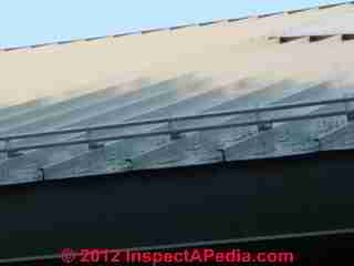 will snow guards for metal roofs help with rain flow