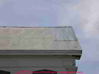 Photograph of a high, steep metal roof - keep off