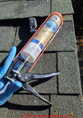 Cold weather silicone sealant used for winter repair of loose noisy flapping aspalt roof shingles (C) Daniel Friedman at InspectApeda.com