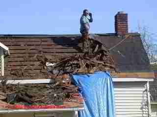 Roof tear off exposes felt underlayment (C) Daniel Friedman