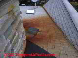 Red roof stains traced to chimney (C) InspectApedia