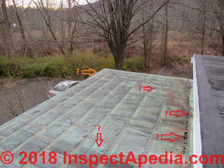 Soldered flat copper shingles on a low slope roof (C) InspectApedia.com Dovber Kahn - Kahnhomeinspectors. com