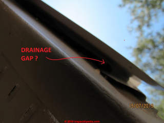 Roof drp edge spaced out from fascia may be good practice but looks uneven here (C) InspectApedia.com Dana