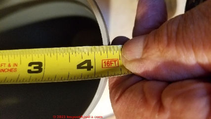 Close up showing actual Cinderella pipe diameter - (C) Daniel Friedman at InspectApedia.com