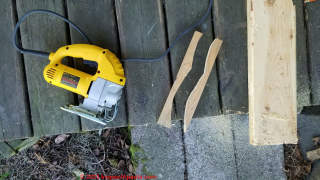 Use a jig saw or coping saw to cut the filler block to mount a flat cover to a curved log wall - (C) Daniel Friedman at InspectApedia.com