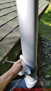 Cleaning the plastic vent piping before painting assures good paint adhesion.  - (C) Daniel Friedman at InspectApedia.com