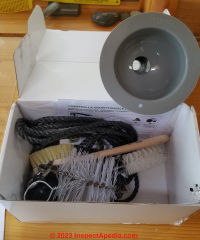Cinderella incinerating toilet maintenance kit contents (C) Daniel Friedman at InspectApedia.com