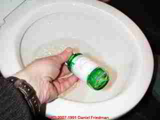 PHOTOGRAPH of
perscription drug being poured into a toilet