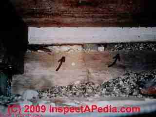 Vermiculite insulation in this attic ceiling may contain asbestos fibers.