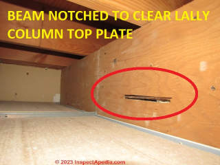 Wood beam notched to fit abutting top plate of a steel Lally column (C) InspectApedia.com Kahn
