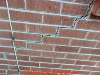 Damage to a brick veneer wall Southwest US b 1957 (C) InspectApedia.com RD