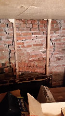 Severe damage to brick wall - unafe (C) InspectApedia.com Rob