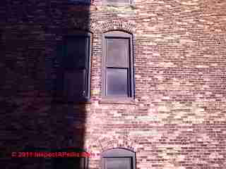 Brick wall frost damage © Daniel Friedman at InspectApedia.com