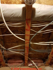Splits or cracks in bottom chord of wood floor truss (C) InspectApedia.com Jason B