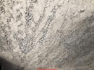 Cold pour and poor mix concrete pour in concrete foundation wall (C) InspectApedia.com Jeff