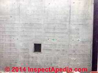 Dark parallel horizontal lines in a newly placed concrete wall (C) InspectAPedia CI