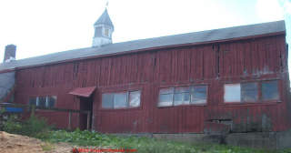 Connecticut post and beam tobacco barn turned horse barn with timber frame damage (C) InspectApedia.com