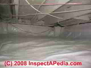 Plastic moisture barrier installed in a crawl space following mold remediation © Daniel Friedman at InspectApedia.com
