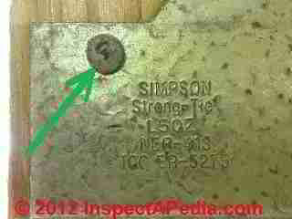 Joist hanger nail installed © D Friedman at InspectApedia.com 