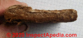 Brown cellulose-based fiberboard insulating sheathing tested for asbestos (C) Daniel Friedman at InspectApedia.com