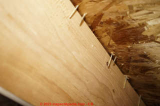 Subfloor fasteners missed supportign joists, saggy bouncy flexing floors resulted (C) InspectApedia.com CB