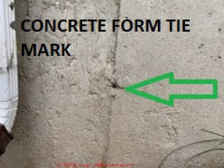 Concrete form tie marks on a Connecticut foundation wall (C) InspectApedia.com ML