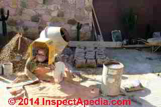 Concrete placement by motor driven cement mixer, Guanajuato, Mexico © Daniel Friedman