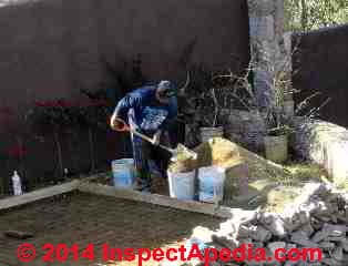 Concrete placement by motor driven cement mixer, Guanajuato, Mexico © Daniel Friedman