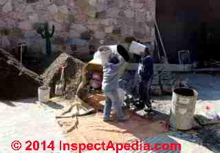 Concrete placement by motor driven cement mixer, Guanajuato, Mexico © Daniel Friedman