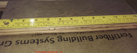 Improper hardwood floor fastener spacing causes floor split damage (C) InspectApedia.com CB