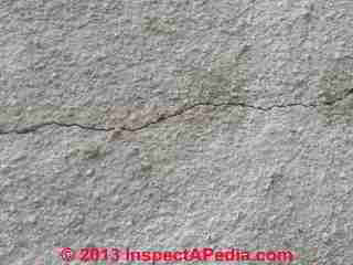 Horizontal wall crack closeup gives clues (C) InspectAPedia