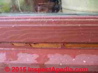 Insect damage at window frame (C) InspectApedia John Huie