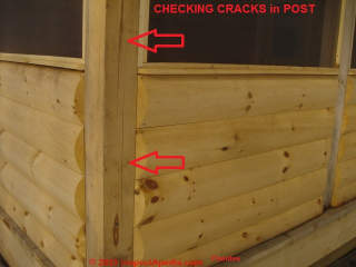 Harmless wood post checking crack at a log home (C) InspectApedia.com Arlene Puentes