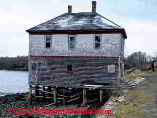 Construction on piers over water - pilings, moisture, movement, vapor barriers © D Friedman at InspectApedia.com 