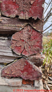 Diamond or wedge cut log ends form drainage at corners of this log home (C) Daniel Friedman at InspectApedia.com