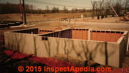 Prefab concrete foundation walls set along Vassar Road, Poughkeepsie NY © Daniel Friedman at InspectApedia.com