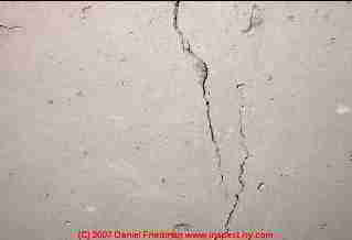 Photograph of a classic shrinkage crack in poured concrete wall.