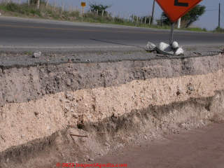 Layers of soil exposed by highway construction, Dolores, Mexico (C) Daniel Friedman at InspectApedia.com