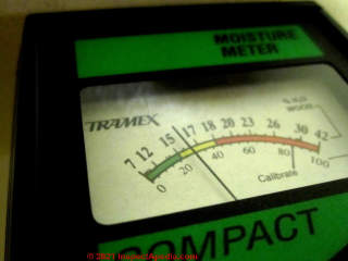 Tramex pin type moisture meter reading moisture level in wood in a "safe" range (C) Daniel Friedman at InspectApedia.com