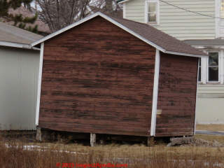 Two Harbors MN shed tipping over due to rotting support posts (C) Daniel Friedman at InspectApedia.com