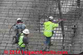 Concrete placement by delivery trucks and concrete pump, large construction project, Vassar College, Poughkeepsie NY © Daniel Friedman