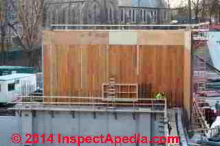 Concrete placement by delivery trucks and concrete pump, large construction project, Vassar College, Poughkeepsie NY © Daniel Friedman