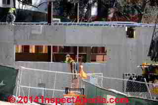 Concrete placement by delivery trucks and concrete pump, large construction project, Vassar College, Poughkeepsie NY © Daniel Friedman