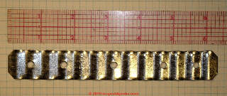 Brick wall veneer tie: traditional corrugated metal strapping (C) Daniel Friedman at InspectApedia.com