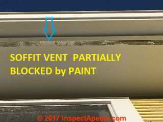 Soffit intake vent openings partially blocked by paint (C) InspectApedia.com S-FL
