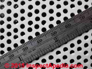 Measurement shows size of soffit vent perforation openings (C) Daniel Friedman